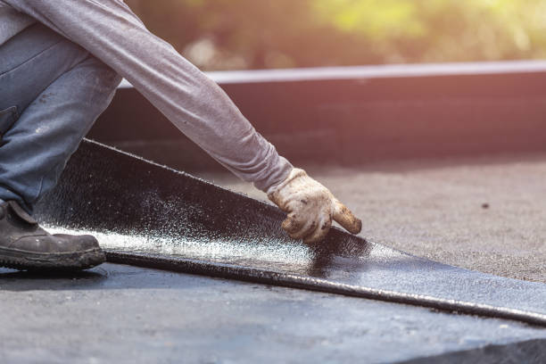 Professional Exterior Waterproofing technician working in Henrietta, NY